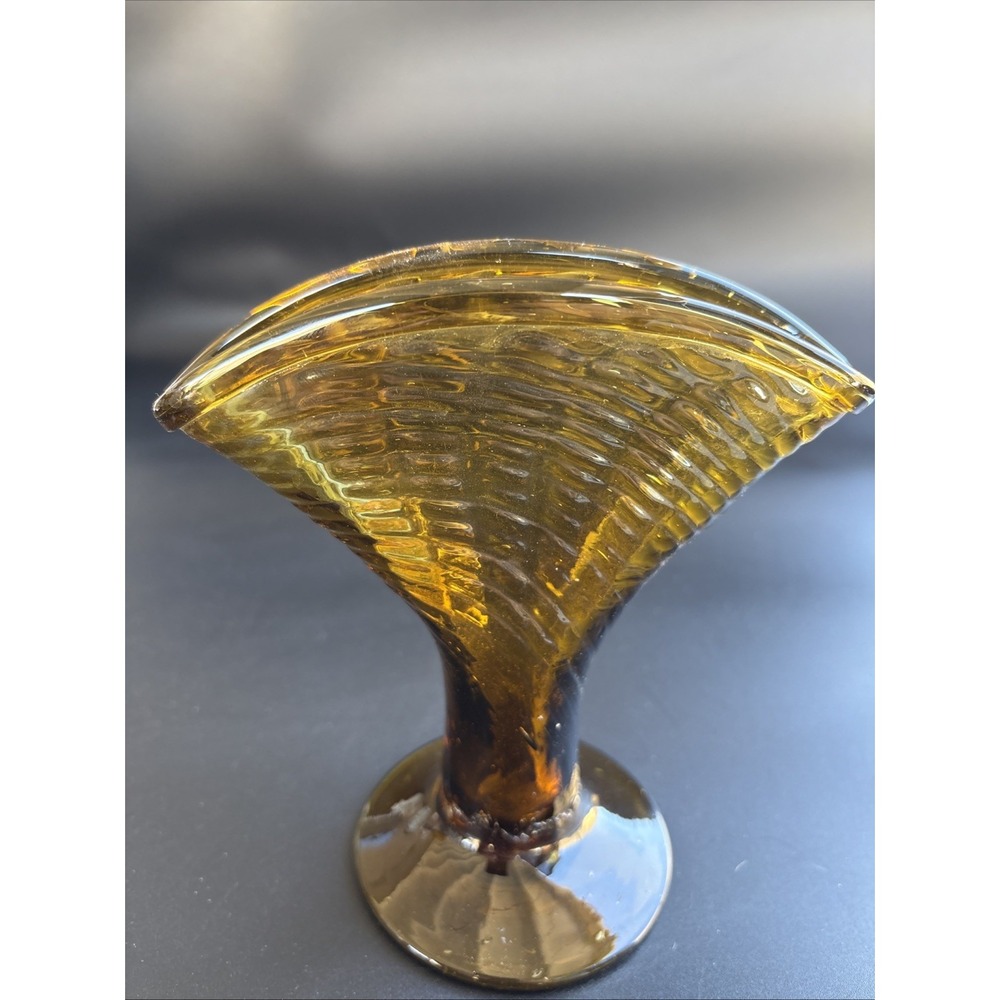 Mid-Century Modern Amber Glass Fan Vase featuring an optic ribbed pattern.
